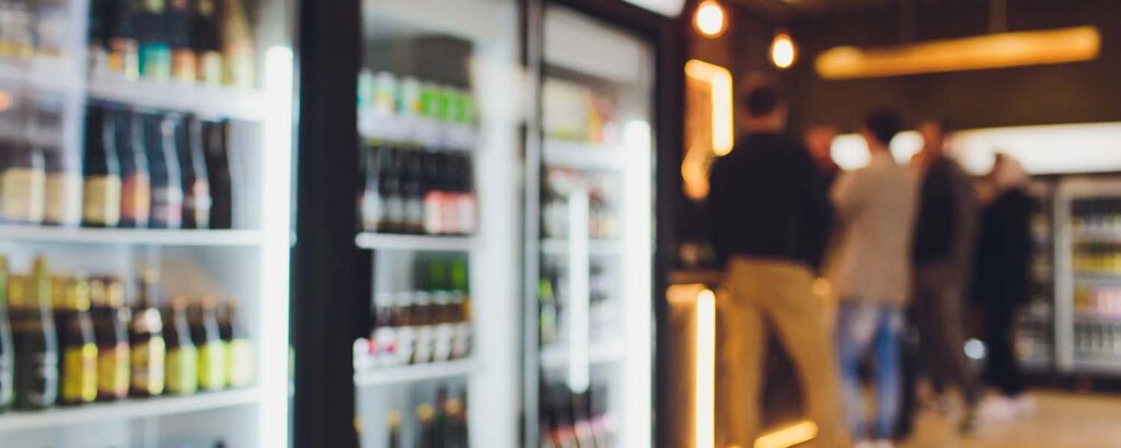 Fridge containing alcohol in a convenience store setting