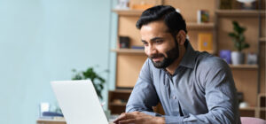 Man reading on computer